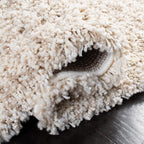 SAFAVIEH Hudson Shag Collection Area Rug - 9' x 12', Ivory & Beige, Modern Abstract Design, Non-Shedding & Easy Care, 2-inch Thick Ideal for High Traffic Areas in Living Room, Bedroom (SGH295C)