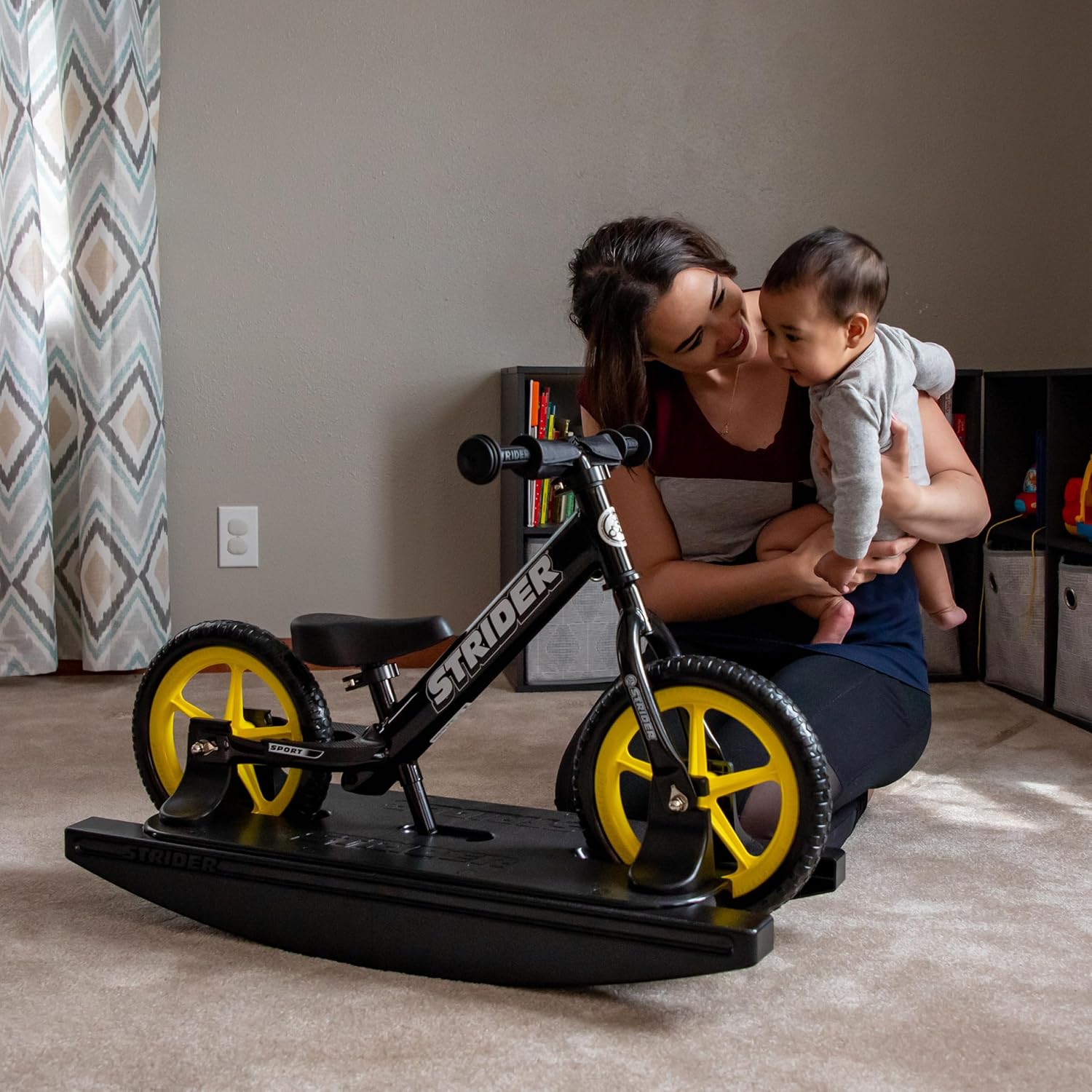 Strider 12” Pro Bike + Rocking Base - Helps Teach Baby How to Ride a Balance Bicycle - for Kids 6 Months to 4 Years - Easy Assembly & Adjustments