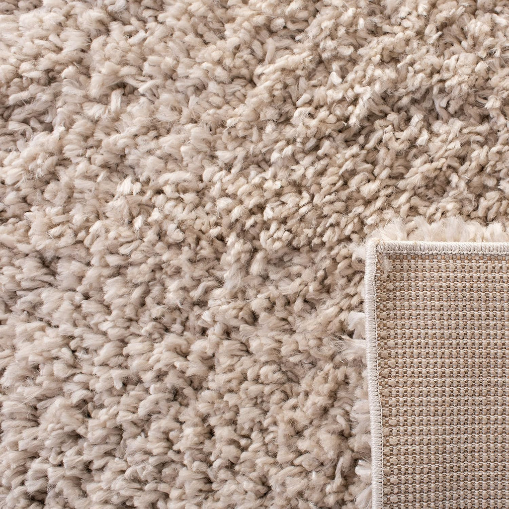 SAFAVIEH August Shag Collection Area Rug - 9' x 12', Beige, Solid Design, Non-Shedding & Easy Care, 1.5-inch Thick Ideal for High Traffic Areas in Living Room, Bedroom (AUG200D)