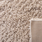 SAFAVIEH August Shag Collection Area Rug - 9' x 12', Beige, Solid Design, Non-Shedding & Easy Care, 1.5-inch Thick Ideal for High Traffic Areas in Living Room, Bedroom (AUG200D)
