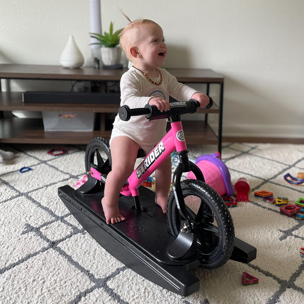 Strider 12” + Rocking Base - Helps Teach Baby How to Ride a Balance Bicycle - for Kids 6 Months to 4 Years - Easy Assembly & Adjustments