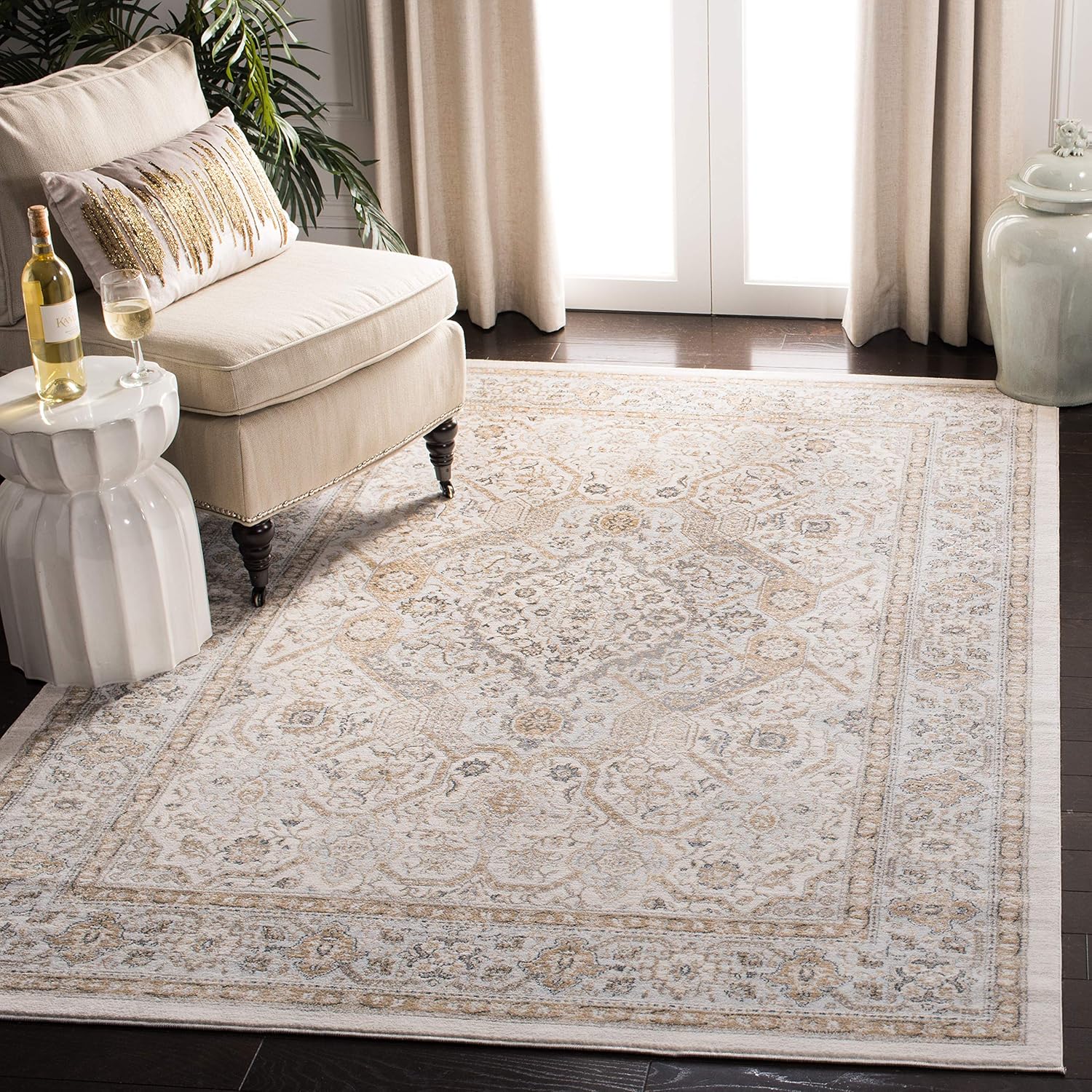 SAFAVIEH Isabella Collection Area Rug - 6'7" x 9', Cream & Beige, Oriental Design, Non-Shedding & Easy Care, Ideal for High Traffic Areas in Living Room, Bedroom (ISA916B)