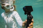 GoPro HERO13 Black Accessory Bundle - Includes The Handler  2 Enduro Batteries  2 Curved Adhesive Mounts  64GB SanDisk MicroSD Card  and Carrying Case