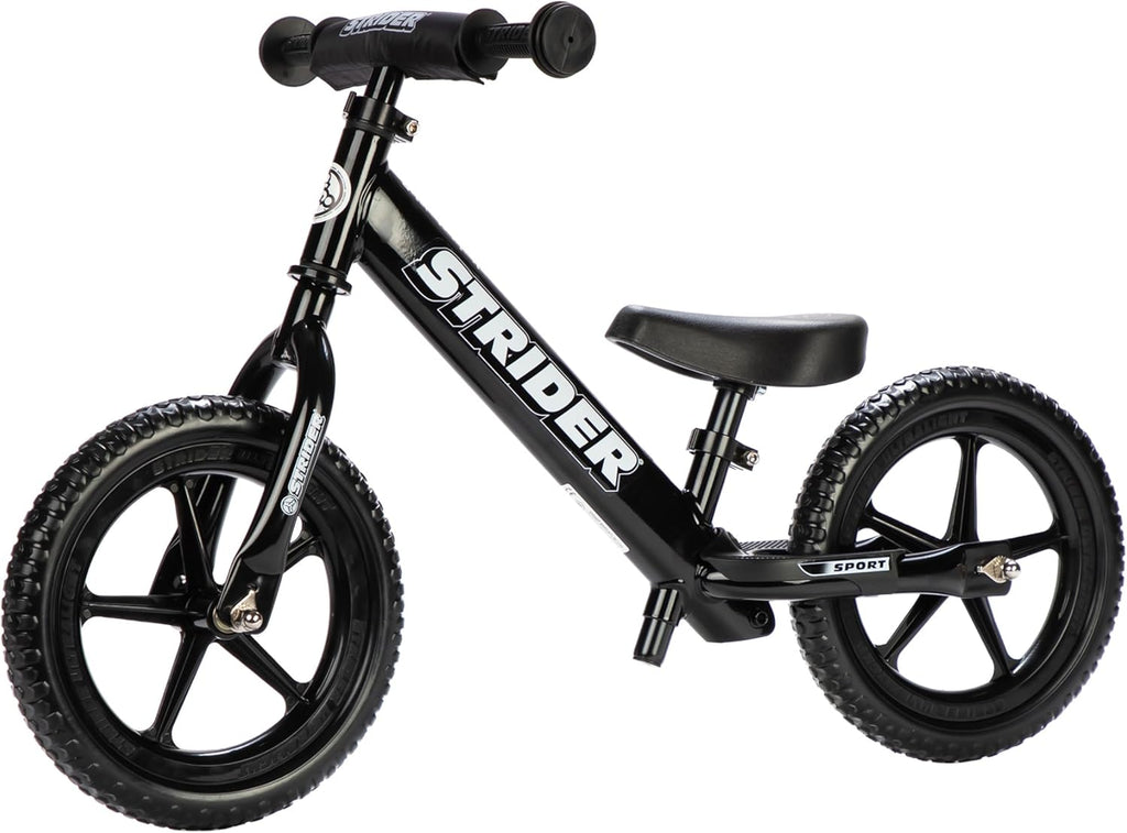 Strider 12” Sport Bike - No Pedal Balance Bicycle for Kids 1 to 4 Years - Includes Safety Pad, Padded Seat, Mini Grips & Flat-Free Tires - Tool-Free Assembly & Adjustments