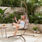 RADIATA Wicker Egg Swing Chair with Stand for Outside, Outdoor Comfy Hanging Egg Patio Chairs with Thick Cushion, 350Lbs Durable Swinging Rattan Chair for Bedroom Porch Backyard Balcony, Brown, Tan