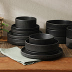 Gibson Elite Deerfield 16-Piece Stoneware Dinnerware Set – Matte Black Reactive Glaze Plates and Bowls, Stackable, Modern Design, Service for 4 – Microwave & Dishwasher Safe