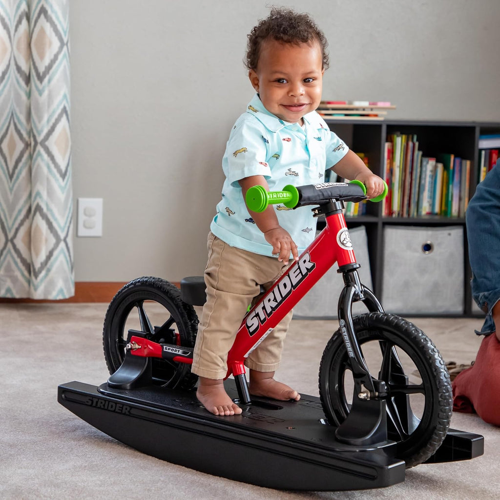 Strider 12” + Rocking Base - Helps Teach Baby How to Ride a Balance Bicycle - for Kids 6 Months to 4 Years - Easy Assembly & Adjustments