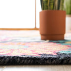 SAFAVIEH Aspen Collection Area Rug - 9' x 12', Charcoal & Blue, Handmade Boho Floral Wool, Ideal for High Traffic Areas in Living Room, Bedroom (APN520H)