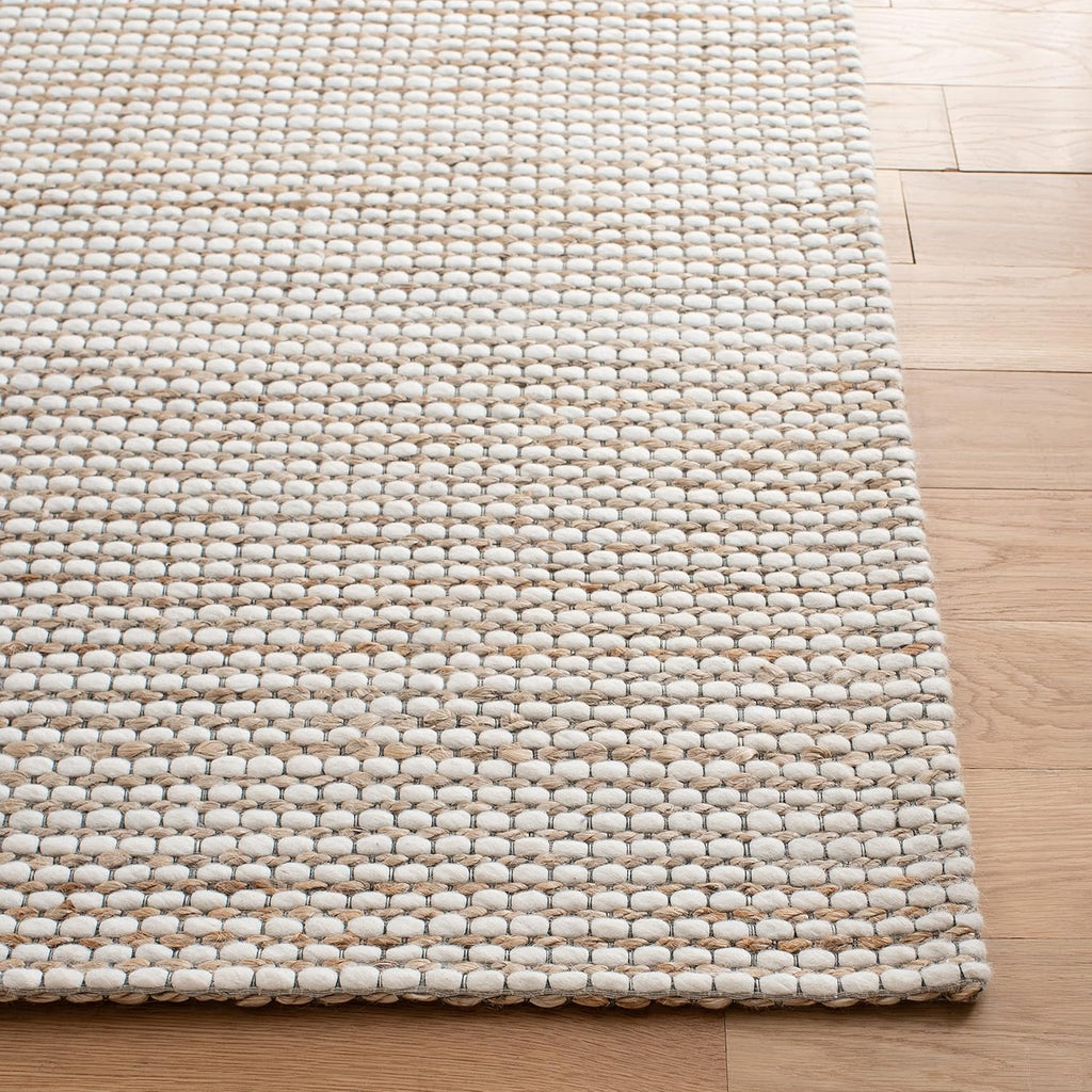SAFAVIEH Natural Fiber Collection Area Rug - 9' x 12', Natural & Ivory, Handmade Farmhouse Jute & Wool, Ideal for High Traffic Areas in Living Room, Bedroom (NFB553A)
