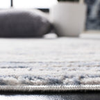 SAFAVIEH Amelia Collection Area Rug - 9' x 12', Ivory & Blue, Modern Abstract Design, Non-Shedding & Easy Care, Ideal for High Traffic Areas in Living Room, Bedroom (ALA768A)