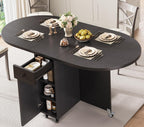 Jocoevol Round Folding Dining Table for 6, Space Saving Drop Leaf Kitchen Table with Storage Drawer, 6 Wheels Oval Gateleg Foldable Dining Table for Small Spaces (Black, 51" x 31.5" x 30")