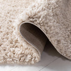 SAFAVIEH August Shag Collection Area Rug - 9' x 12', Beige, Solid Design, Non-Shedding & Easy Care, 1.5-inch Thick Ideal for High Traffic Areas in Living Room, Bedroom (AUG200D)