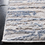 SAFAVIEH Amelia Collection Area Rug - 9' x 12', Ivory & Blue, Modern Abstract Design, Non-Shedding & Easy Care, Ideal for High Traffic Areas in Living Room, Bedroom (ALA768A)