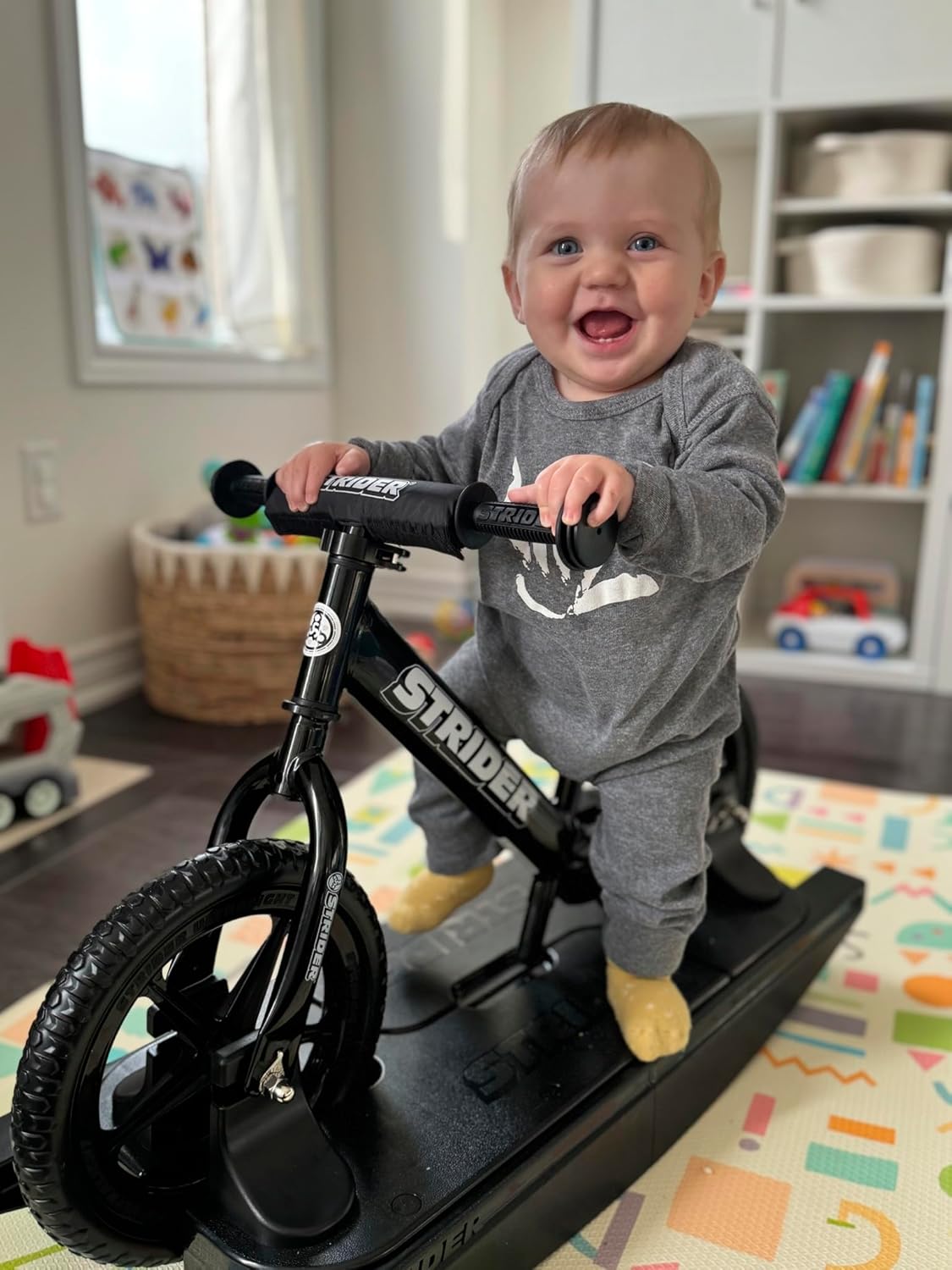 Strider 12” Pro Bike + Rocking Base - Helps Teach Baby How to Ride a Balance Bicycle - for Kids 6 Months to 4 Years - Easy Assembly & Adjustments