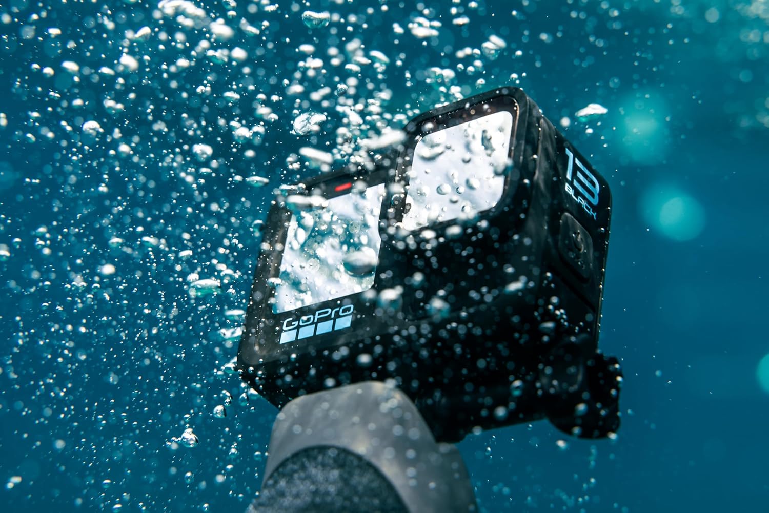 GoPro HERO13 Black Accessory Bundle - Includes The Handler  2 Enduro Batteries  2 Curved Adhesive Mounts  64GB SanDisk MicroSD Card  and Carrying Case