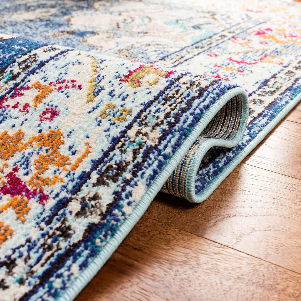 SAFAVIEH Monaco Collection Area Rug - 9' x 12', Navy & Light Blue, Non-Shedding & Easy to Clean, Distressed Medallion Design, Ideal for Living Room, Bedroom, Dining Space (MNC243N)