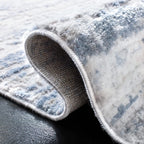 SAFAVIEH Amelia Collection Area Rug - 9' x 12', Ivory & Blue, Modern Abstract Design, Non-Shedding & Easy Care, Ideal for High Traffic Areas in Living Room, Bedroom (ALA768A)