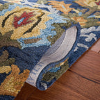 SAFAVIEH Blossom Collection Area Rug - 9' x 12', Navy & Multi, Handmade Wool, Ideal for High Traffic Areas in Living Room, Bedroom (BLM402A)