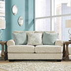 Signature Design by Ashley Monaghan Vintage Loveseat with Accent Pillows, Reversible Cushions and Rolled Arms, Beige