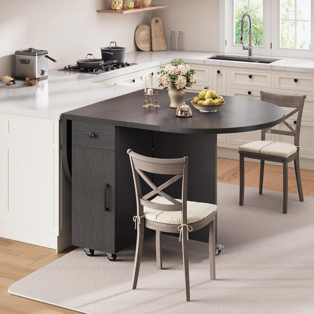 Jocoevol Round Folding Dining Table for 6, Space Saving Drop Leaf Kitchen Table with Storage Drawer, 6 Wheels Oval Gateleg Foldable Dining Table for Small Spaces (Black, 51" x 31.5" x 30")