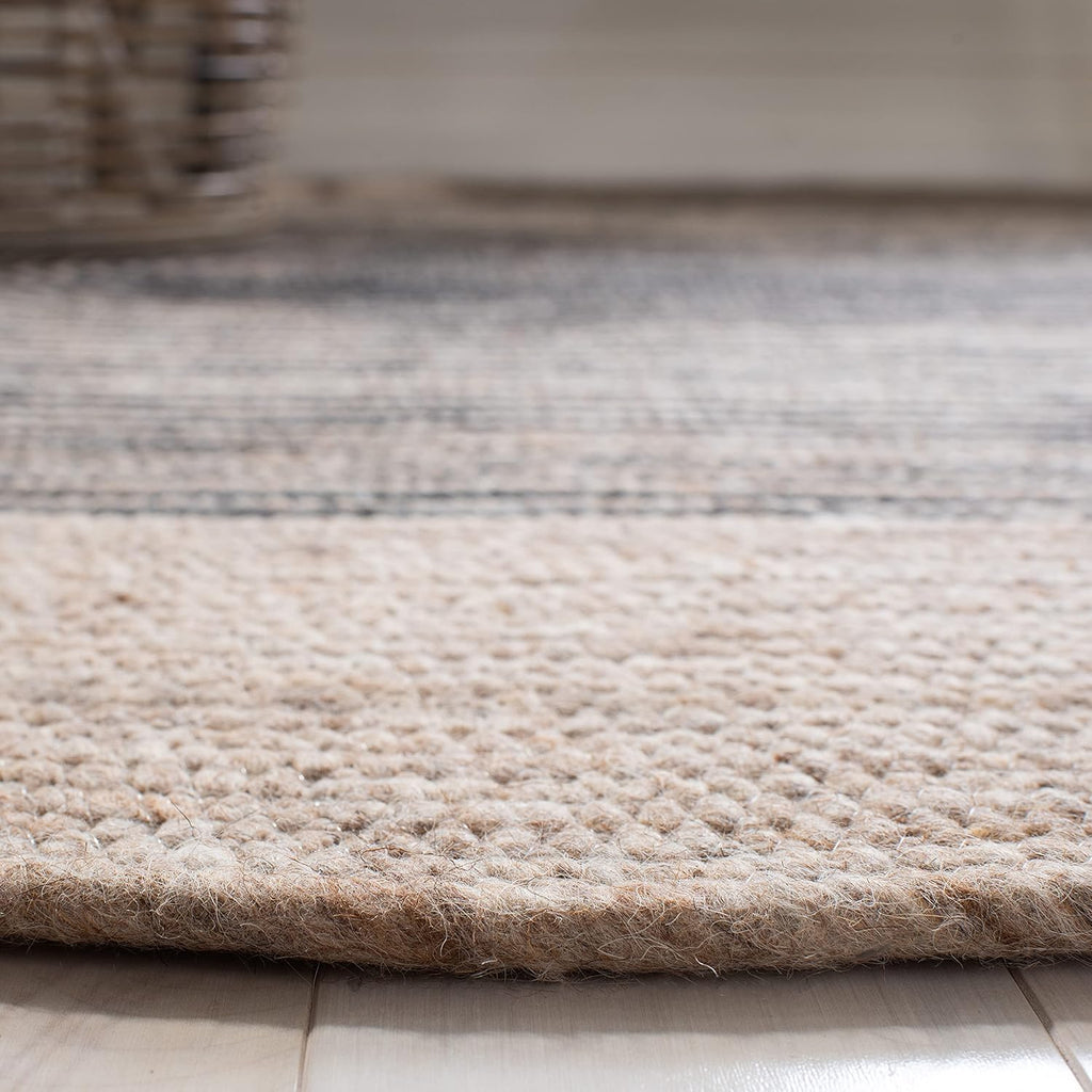 SAFAVIEH Braided Collection Area Rug - 8' x 10' Oval, Beige & Black, Handmade Country Cottage Reversible Wool, Ideal for High Traffic Areas in Living Room, Bedroom (BRD904B)