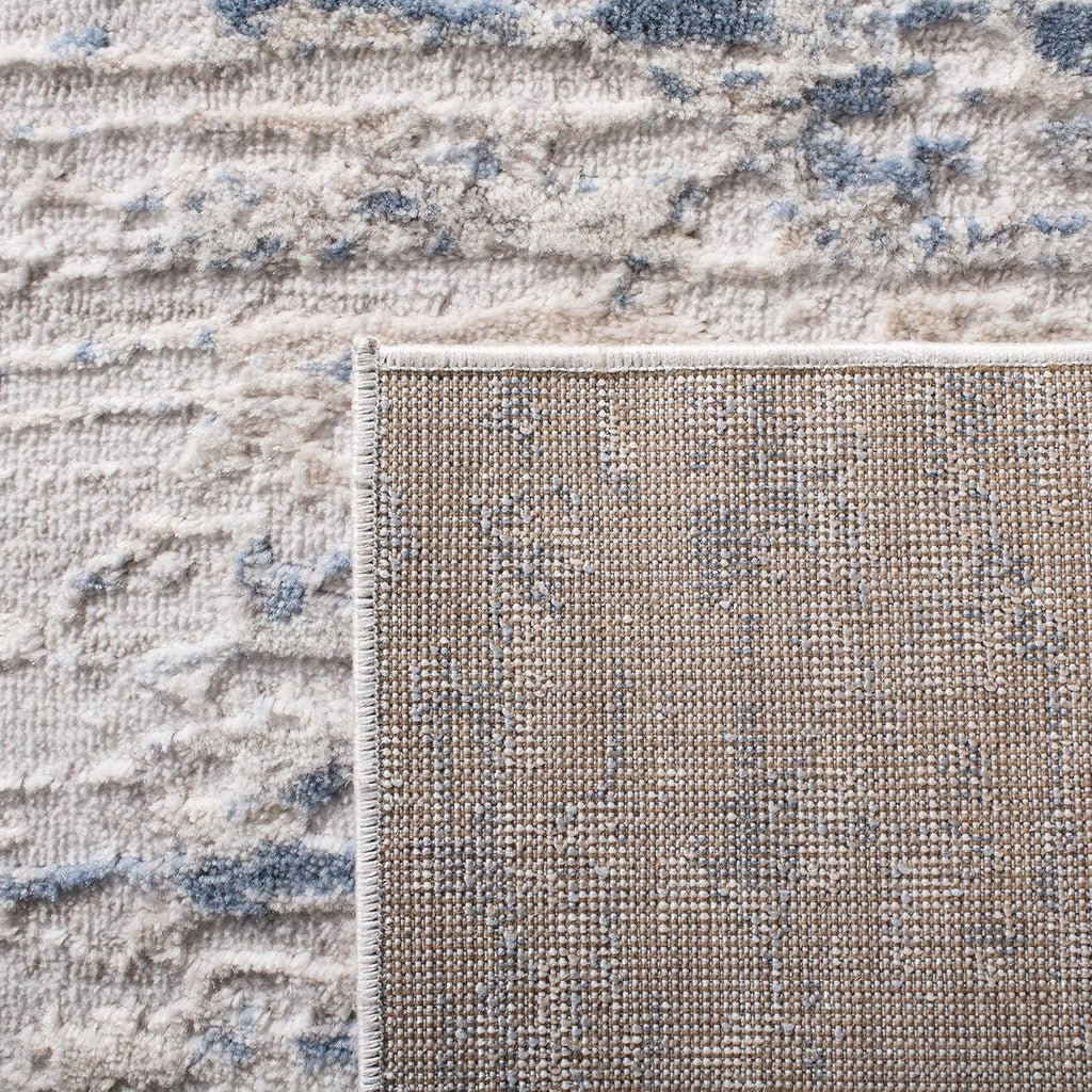 SAFAVIEH Amelia Collection Area Rug - 9' x 12', Ivory & Blue, Modern Abstract Design, Non-Shedding & Easy Care, Ideal for High Traffic Areas in Living Room, Bedroom (ALA768A)