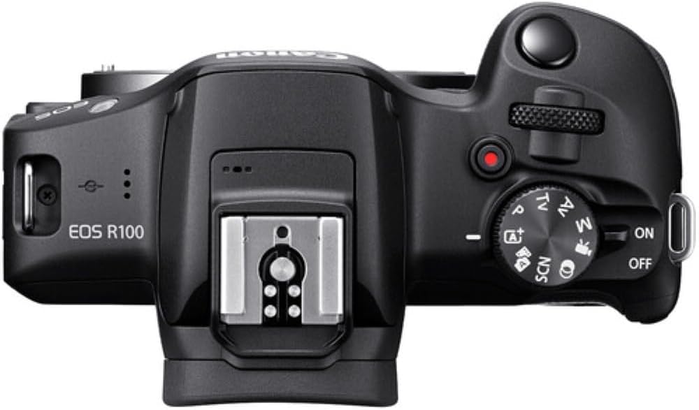 Canon EOS R100 Mirrorless Camera with RF-S18-45mm F4.5-6.3 IS STM Lens Kit  24.1 Megapixel CMOS (APS-C) Sensor  4K Video  RF Mount | Black Bundled with 64GB Memory Card & Camera Shoulder Bag (3 Items)